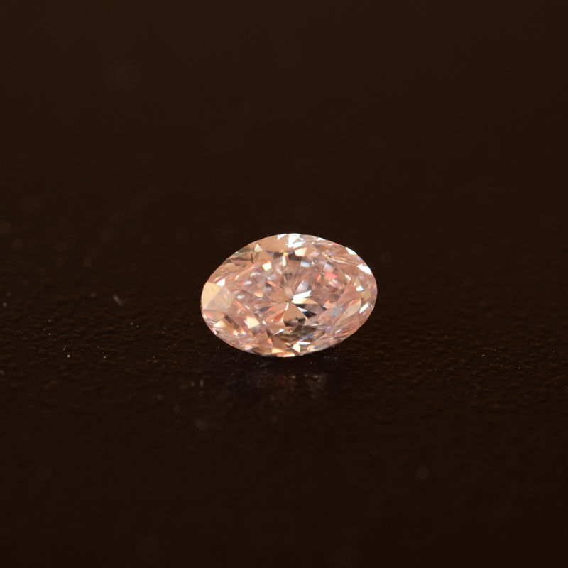 0,56 ct, Fancy Light Orangy Pink, SI1, Oval, GIA Certified