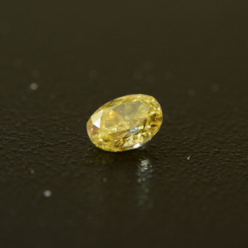 0,27 ct, Fancy Intense Orange-Yellow, VS2, Oval, IGI Certified