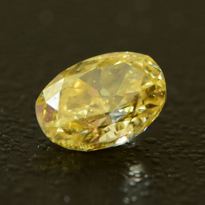 0,27 ct, Fancy Intense Orange-Yellow, VS2, Oval, IGI Certified