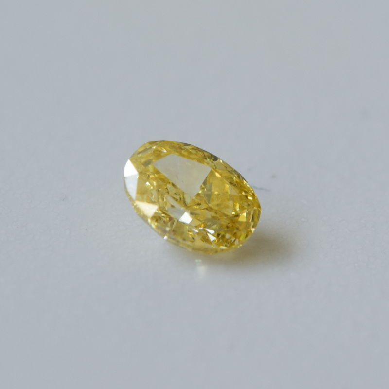 0,27 ct, Fancy Intense Orange-Yellow, VS2, Oval, IGI Certified