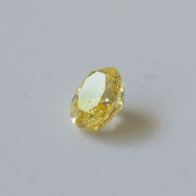 0,27 ct, Fancy Intense Orange-Yellow, VS2, Oval, IGI Certified