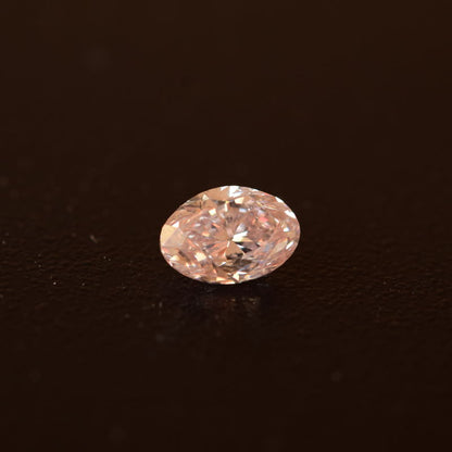 0,56 ct, Fancy Light Orangy Pink, SI1, Oval, GIA Certified