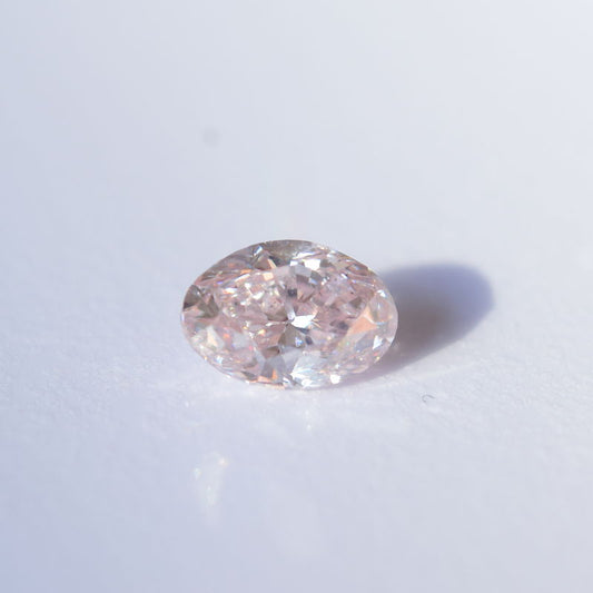 0,56 ct, Fancy Light Orangy Pink, SI1, Oval, GIA Certified