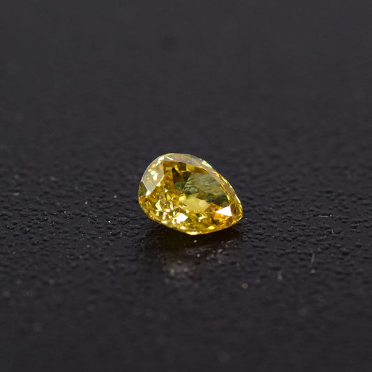 0,26 ct, Fancy Orangy Yellow, VS2, Pear, IGI Certified