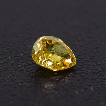 0,26 ct, Fancy Orangy Yellow, VS2, Pear, IGI Certified