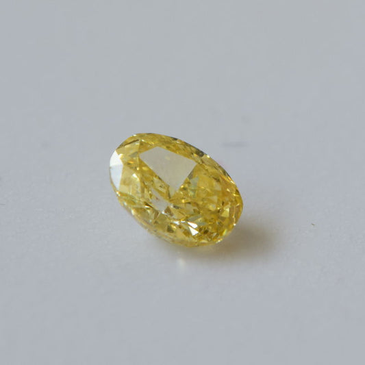 0,27 ct, Fancy Intense Orange-Yellow, VS2, Oval, IGI Certified