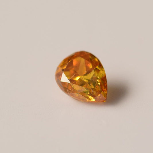 0,12 ct, Fancy Intense Yellow-Orange, I1, Pear, IGI Certified