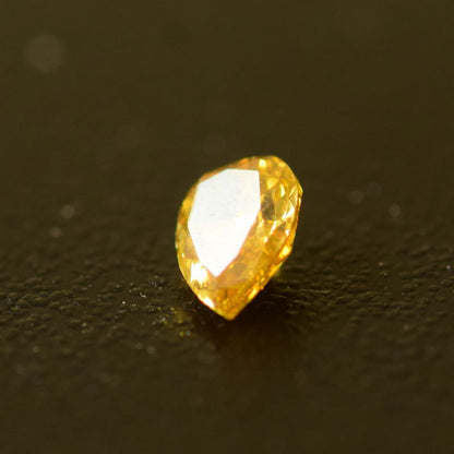 0,24 ct, Fancy Intense Orangy Yellow, SI2, Pear, IGI Certified