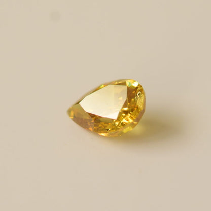 0,22 ct, Fancy Deep Orangy Yellow, I1, Pear, IGI Certified