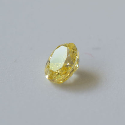 0,27 ct, Fancy Intense Orange-Yellow, VS2, Oval, IGI Certified