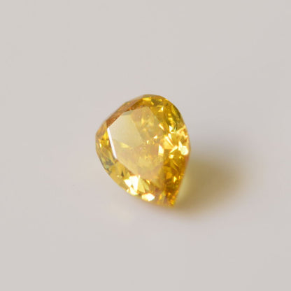 0,24 ct, Fancy Intense Orangy Yellow, SI2, Pear, IGI Certified