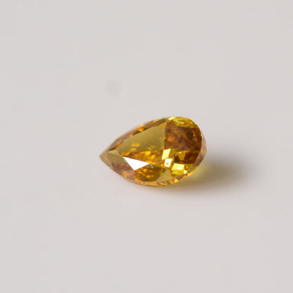 0,16 ct, Fancy Deep Orangy Brownish Yellow, I1, Pear, IGI Certified